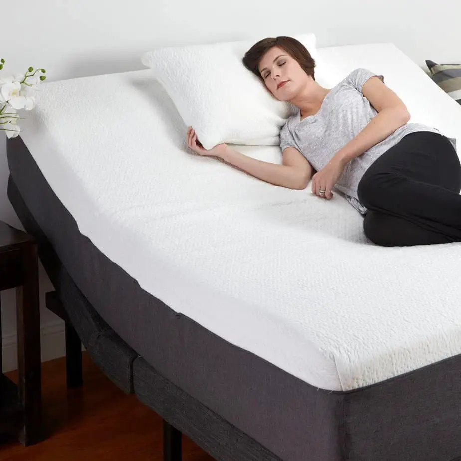woman lying on an adjustable bed