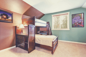 A loft bed placed in a kid's bedroom