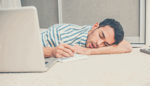 man sleeping at work