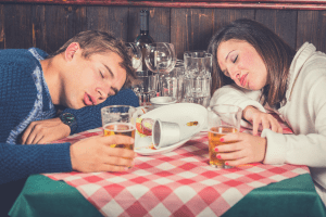 couple sleeping after dinner