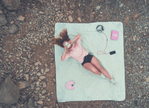 girl lying down on a futon