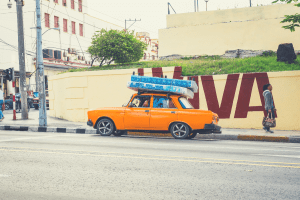 taxi carrying mattresses