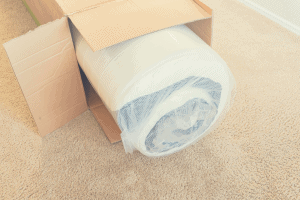 mattress wrapped in a box